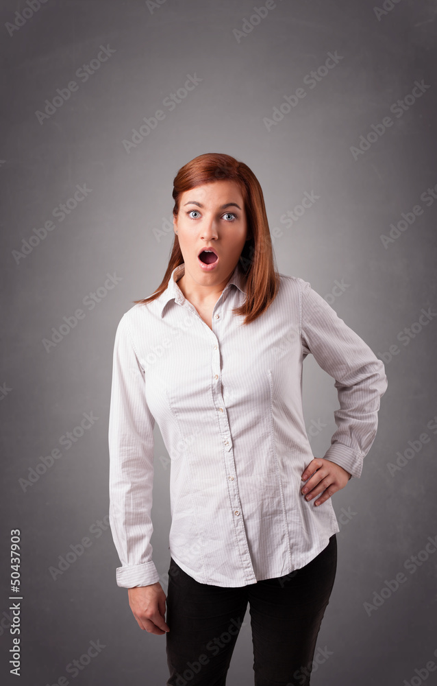 Young woman standing and thinking with copy space Young woman standing and thinking with copy space