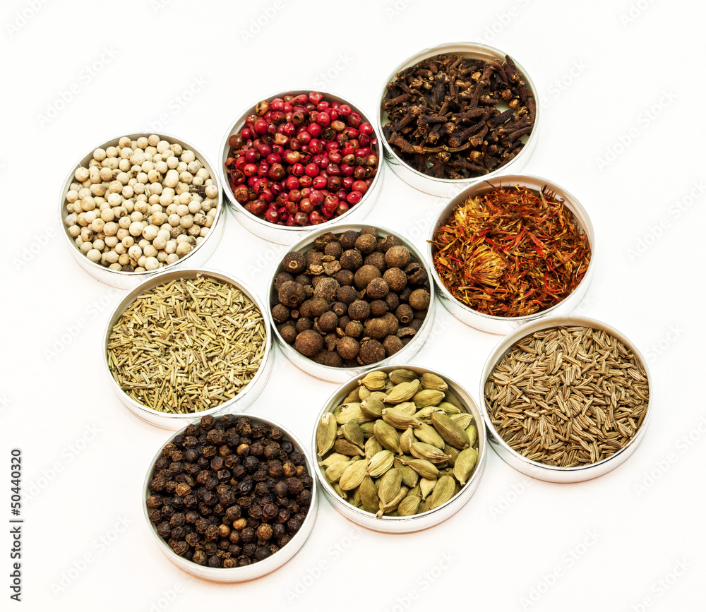 Nine types of spices in small bowls