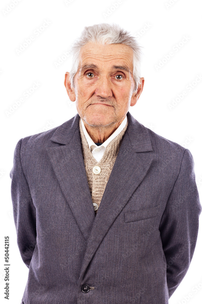 Portrait of an old man looking at camera