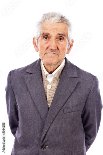 Obraz na płótnie Portrait of an old man looking at camera w salonie