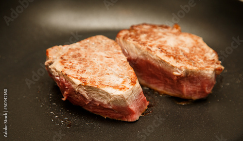 Two Fillets Sauteing in Pan