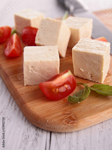 tofu with tomatoes on board