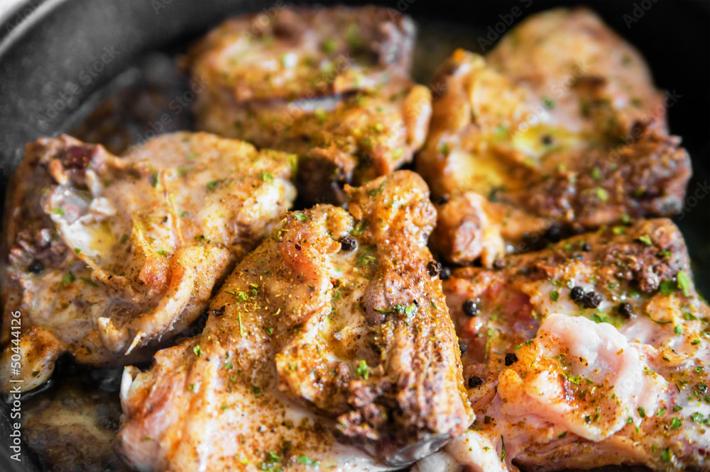 Chicken on frying pan