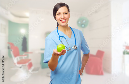 Doctor with green apple