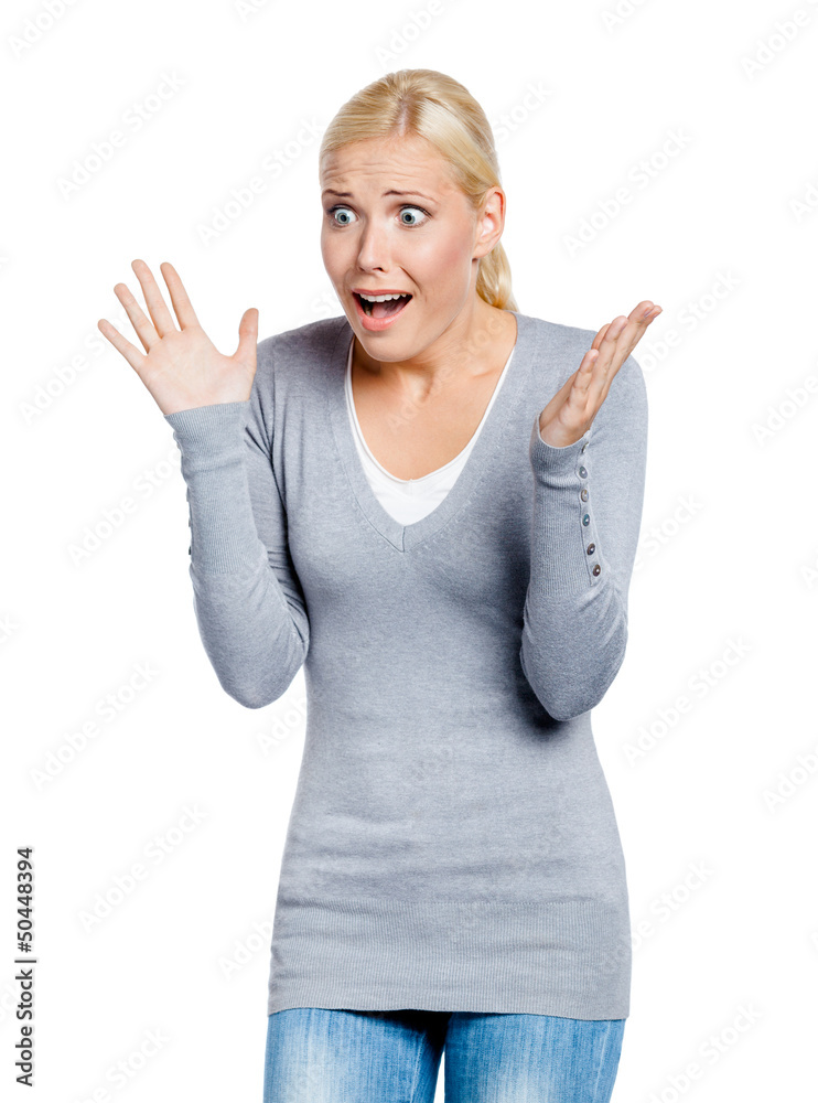 Shocked woman with her mouth opened spread hands Shocked woman with her mouth opened spread hands
