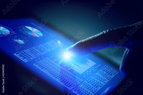 Closeup of finger touching tablet-pc screen