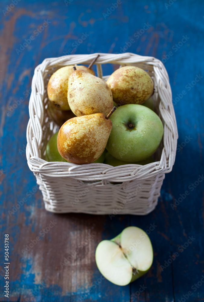 Apples and pears in a basket
