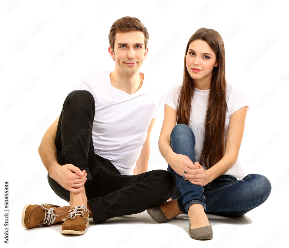 Loving couple sitting with back to each other
