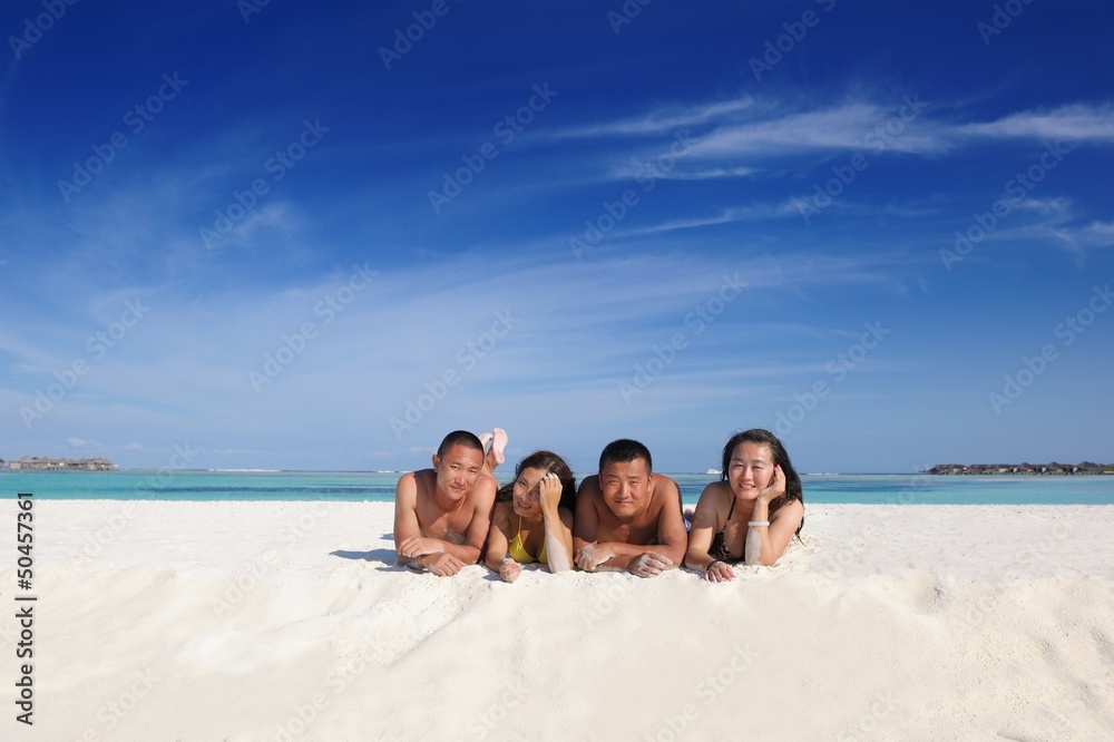 Fototapeta premium group of happy young people have fun on bach