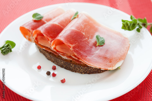 slices of appetizing ham and corn bread