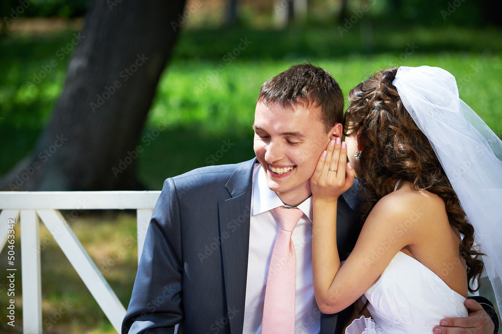 Naklejka premium Bride says secret to groom