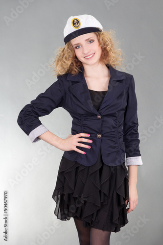 young sailor woman over grey