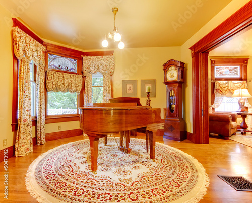 Luxury old American house living room with piano and gold colors