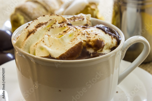 Hot chocolate cup with whipped cream
