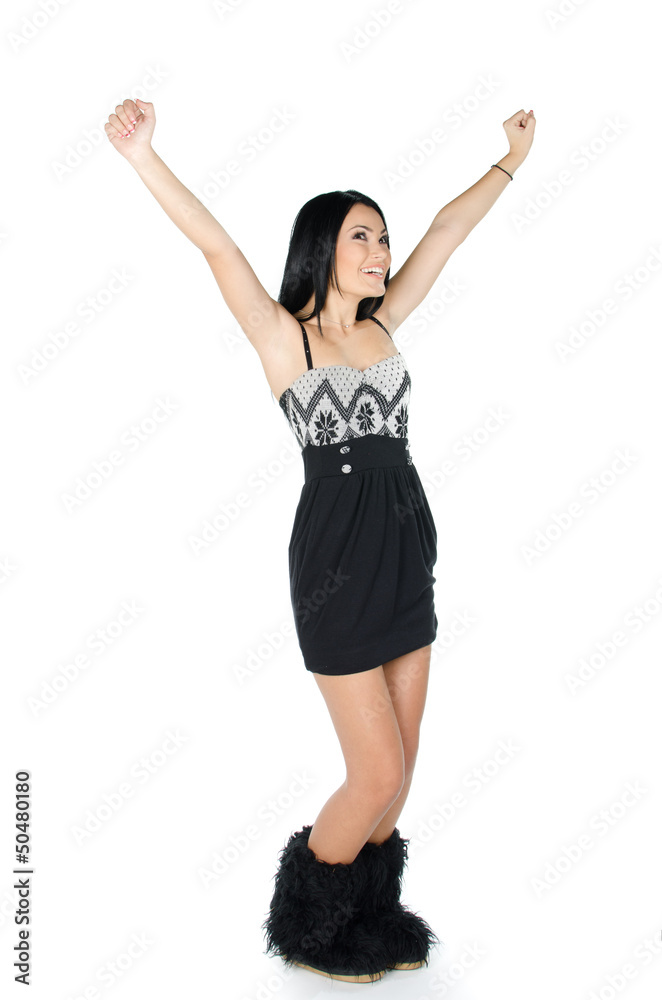 Beautiful brunette posing with her arms up and wearing furry boa Beautiful brunette posing with her arms up and wearing furry boa