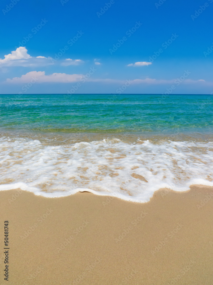 A beach view on a sunny day in Mediterranean coast
