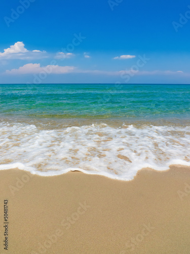 A beach view on a sunny day in Mediterranean coast