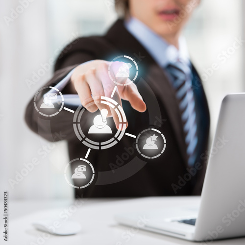 Technology concept. Businessman and virtual interface with web a photo