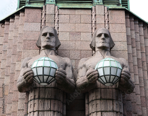 Statues at the railway station in Helsinki.