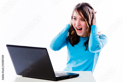 smart and beautiful girl working on a laptop