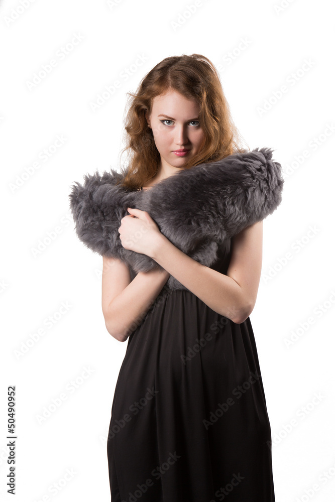 woman wearing an elegant black dresst and winter fur hat woman wearing an elegant black dresst and winter fur hat