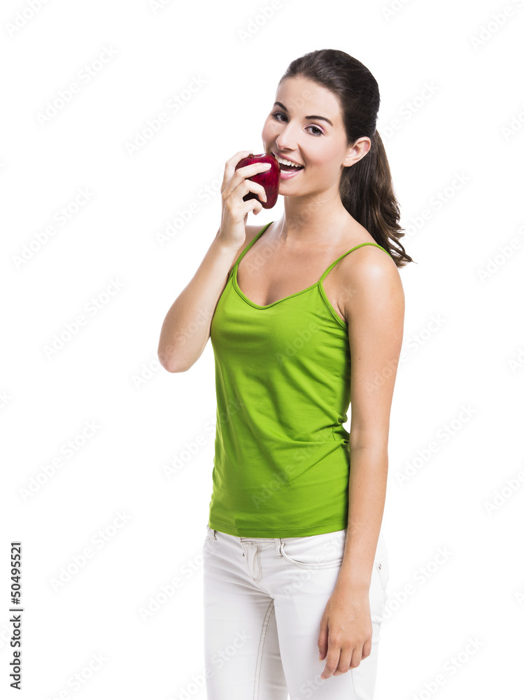 Healthy woman eating an apple