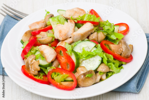 salad with chicken, mushrooms and vegetables