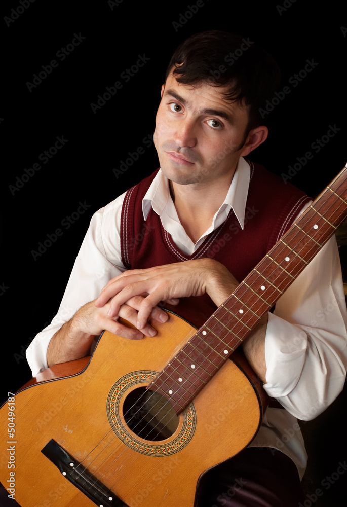 Obraz premium man with a guitar