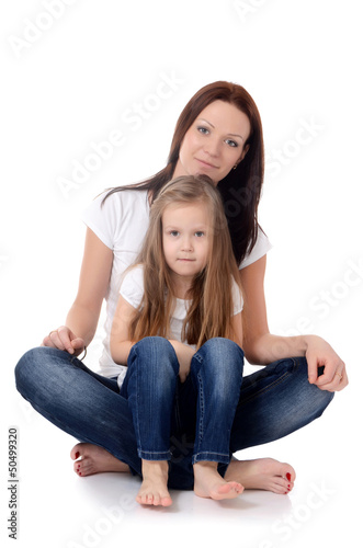 Mum with a daughter isolated on white