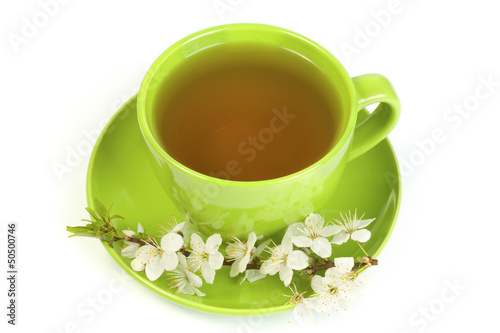 Cherry green tea in a mug