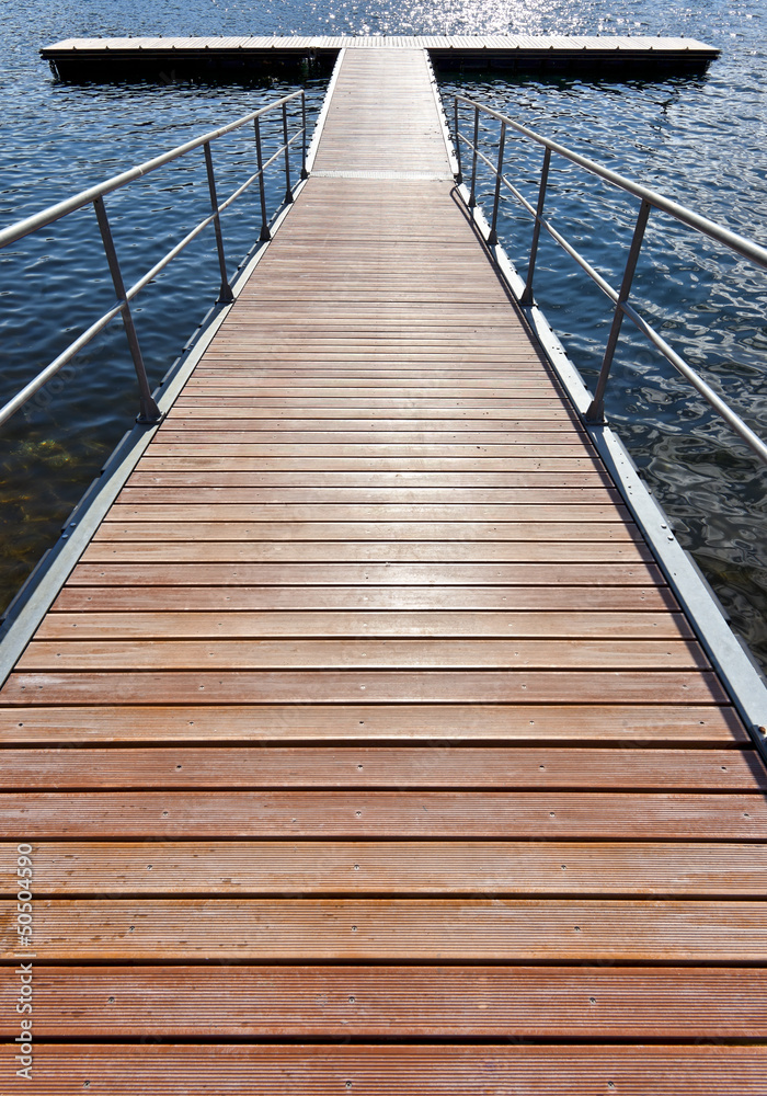 Old wooden jetty at a lake Old wooden jetty at a lake