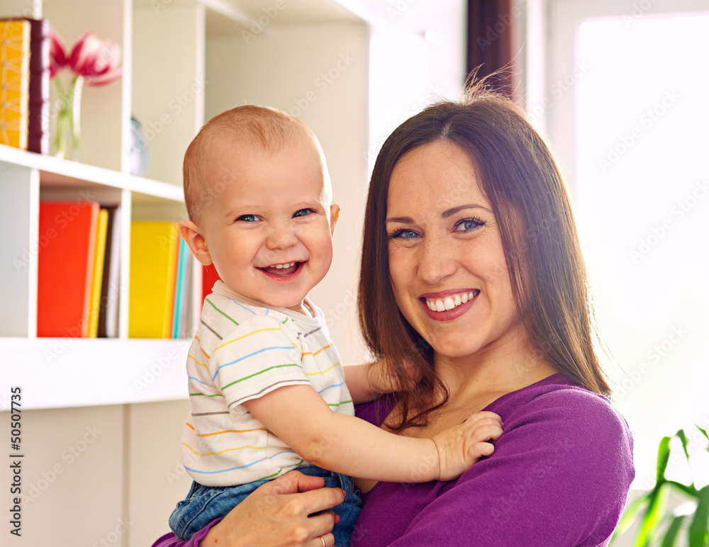 mother with laughing son looking at camera mother with laughing son looking at camera