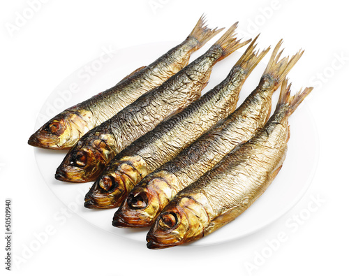 Smoked herring in a plate photo