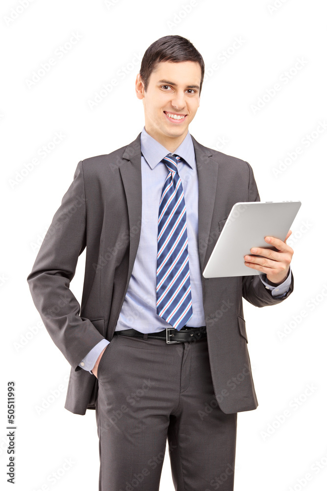 Smiling businessman holding a tablet Smiling businessman holding a tablet