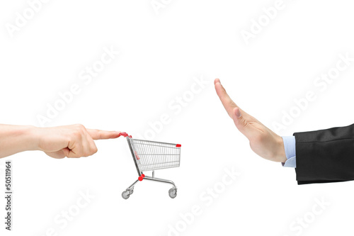 Finger pushing an empty shopping cart and male hand gesturing st