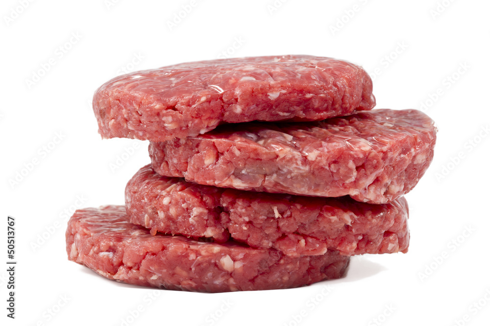 raw hamburgers with transparent protective film raw hamburgers with transparent protective film