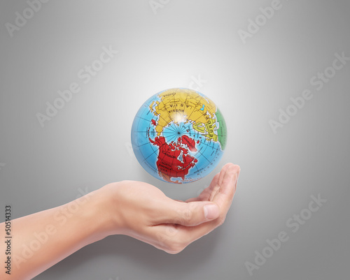 Globe earth in human hand