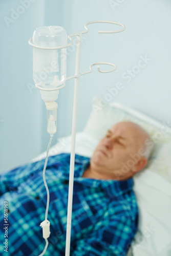 Patient at hospital with dropper photo