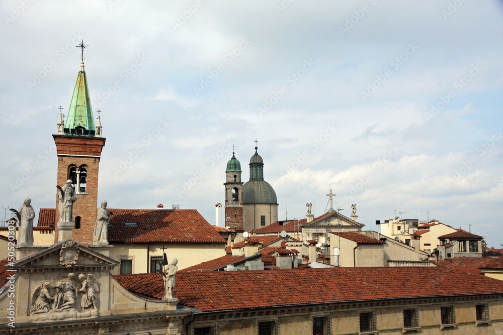 steeples of churches that rise above the houses of Vicenza
