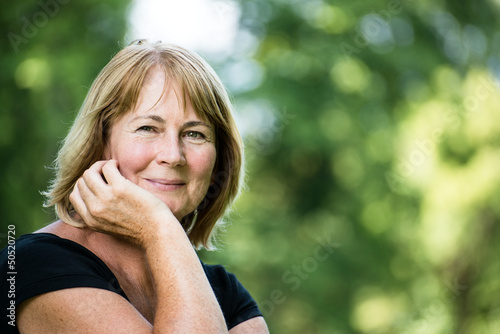 Canvastavla Smiling mature woman outdoor portrait