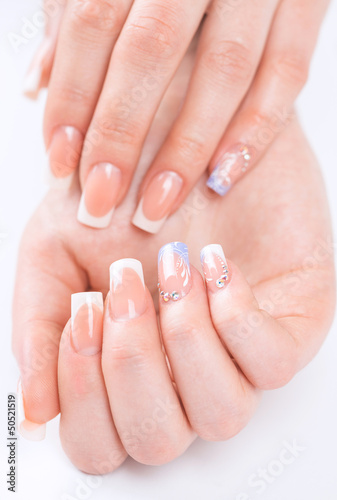 Beautiful female hands with french manicure