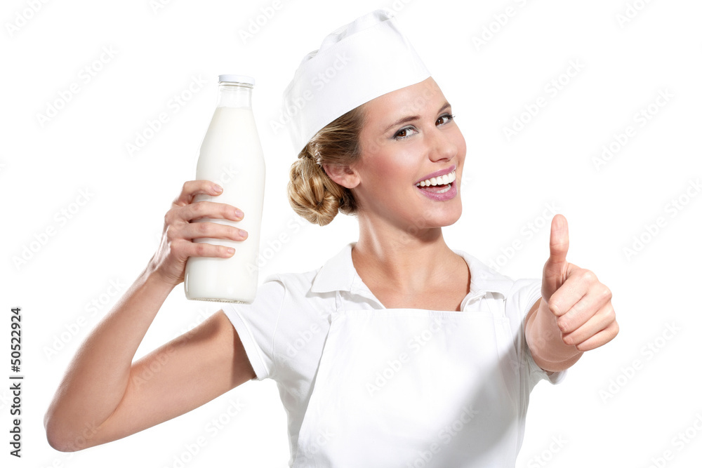 young happy milkwoman showing a bottle of fresh milk young happy milkwoman showing a bottle of fresh milk