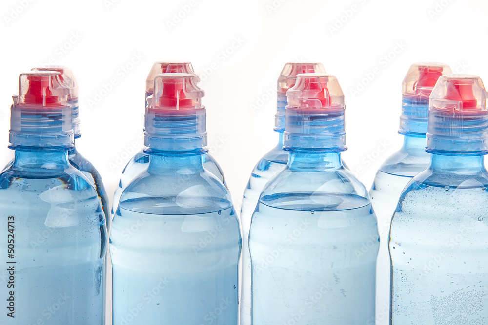 Plastic bottle of drinking water isolated on white Plastic bottle of drinking water isolated on white