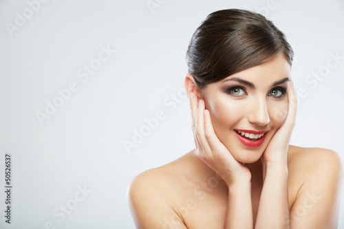 Beautiful young woman portrait isolated on studio background.