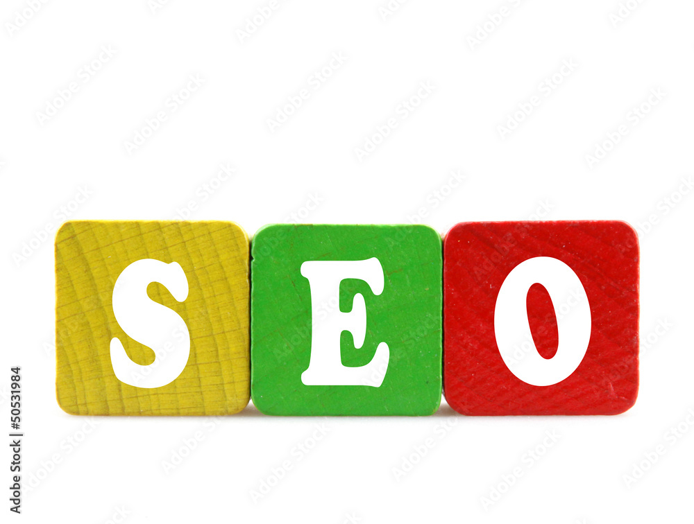 isolated text in wooden building blocks isolated text in wooden building blocks