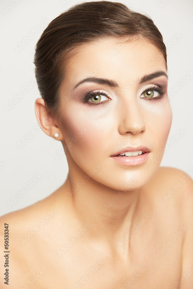 Close up portrait of beautiful young woman face.