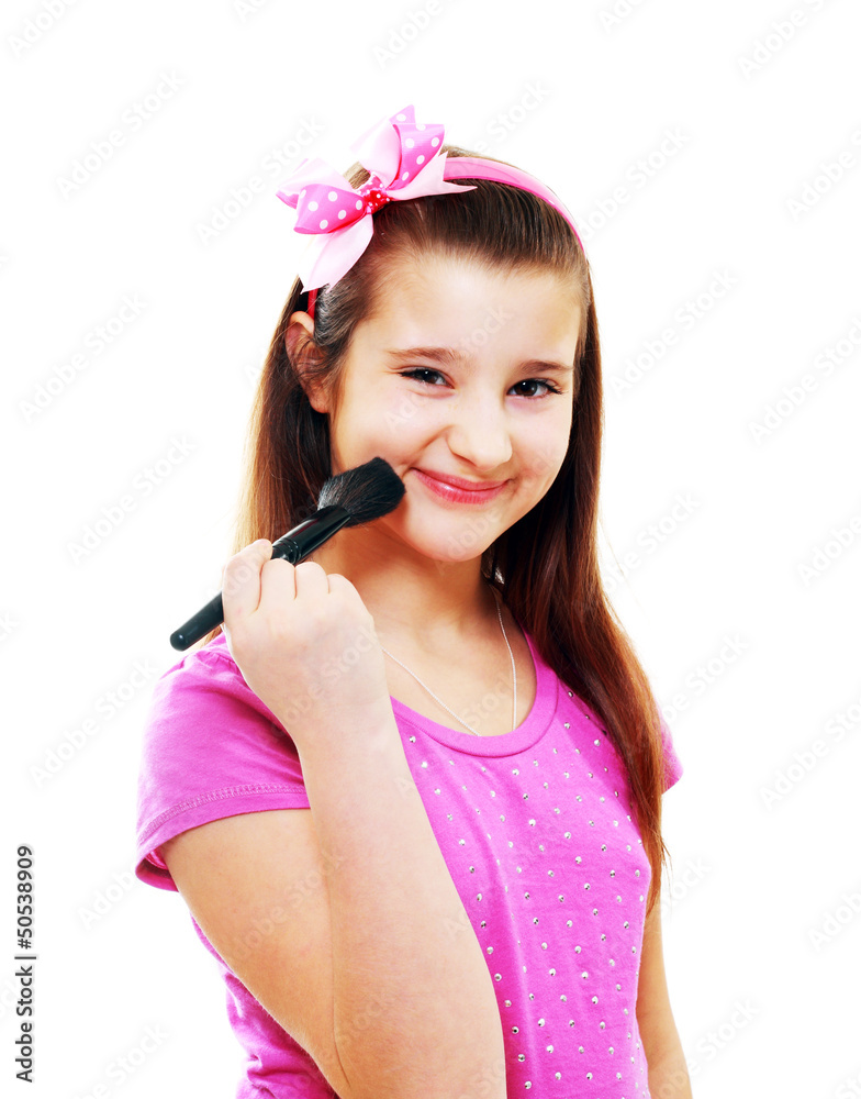 girl putting on makeup