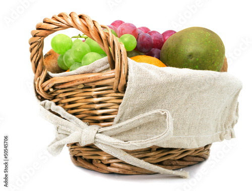 Fruits in the basket on a white background
