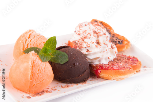 Brown and oranre ice cream on bowl