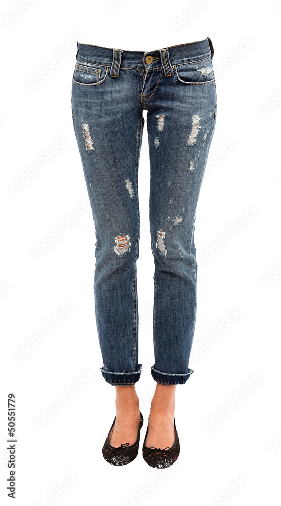 Young woman legs in worn jeans and sequins ballerinas Young woman legs in worn jeans and sequins ballerinas